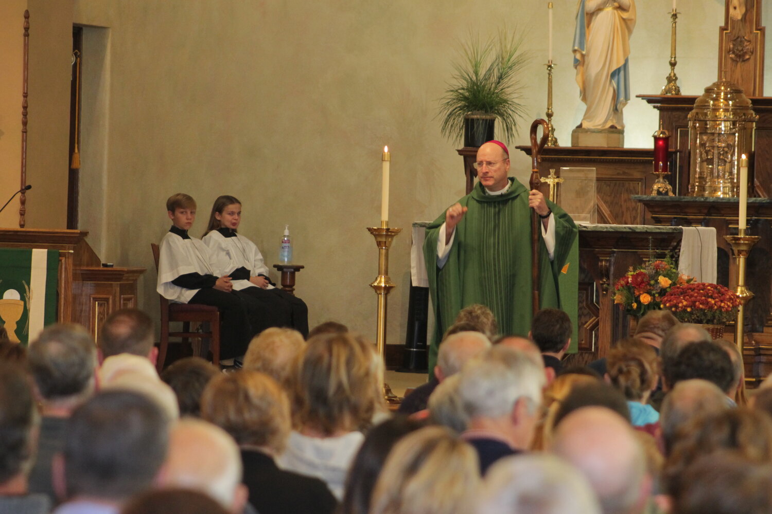 Bishop W. Shawn McKnight preaches the homily at Sunday Mass on Nov. 19 in Immaculate Conception Church in Jefferson City.
